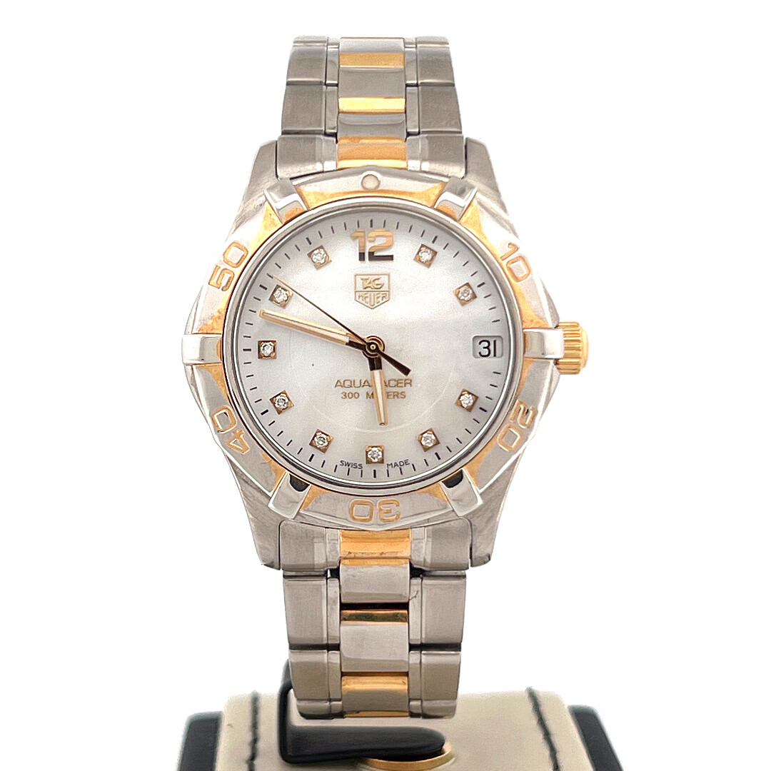 TAG Heuer Aquaracer Lady
Gold Plated/Steel MOP Diamond Dial 32MM Quartz