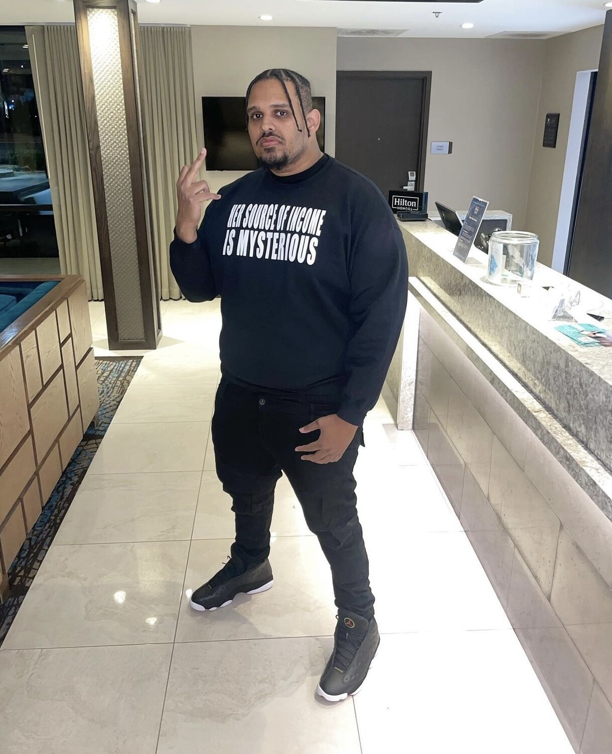 HER SOURCE OF INCOME IS MYSTERIOUS - T-Shirt
