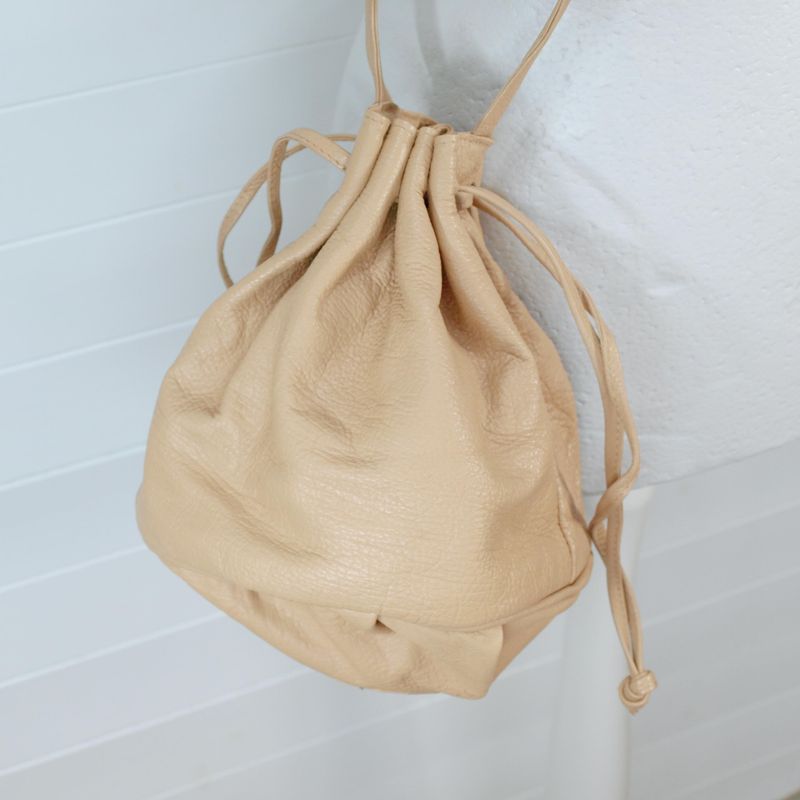 Alami Beige Leather Crossbody Drawstring Bag