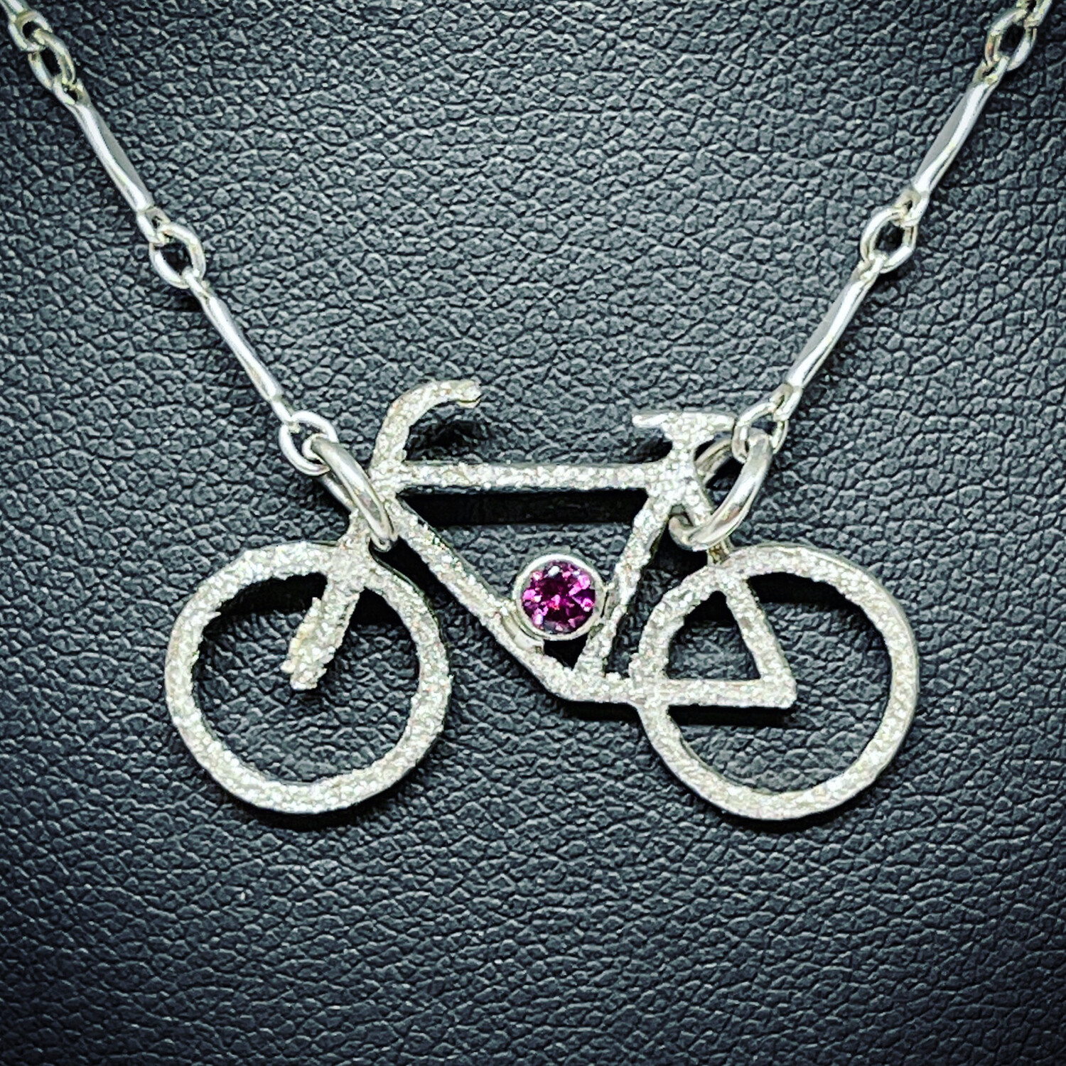 Bicycle Pendant w. Rhodolite Garnet