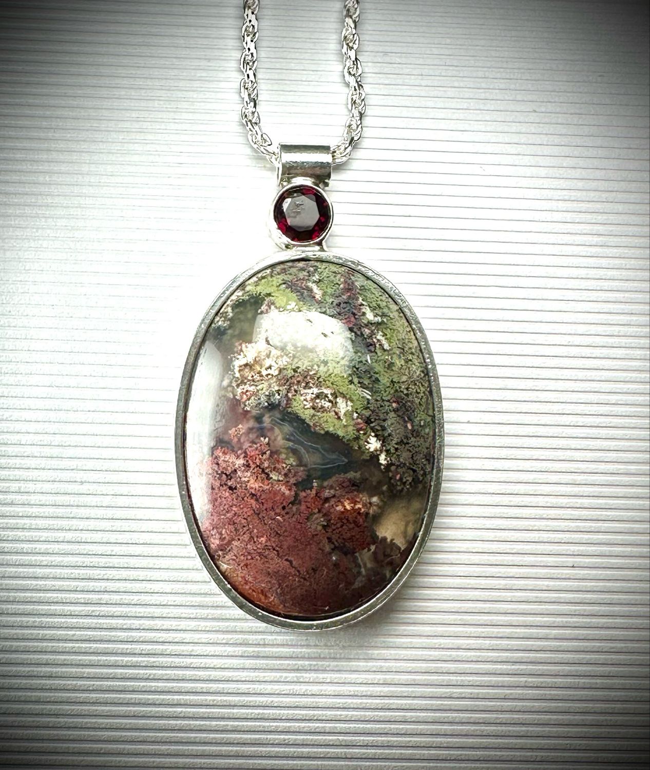 Moss agate With Garnet Accent Pendant