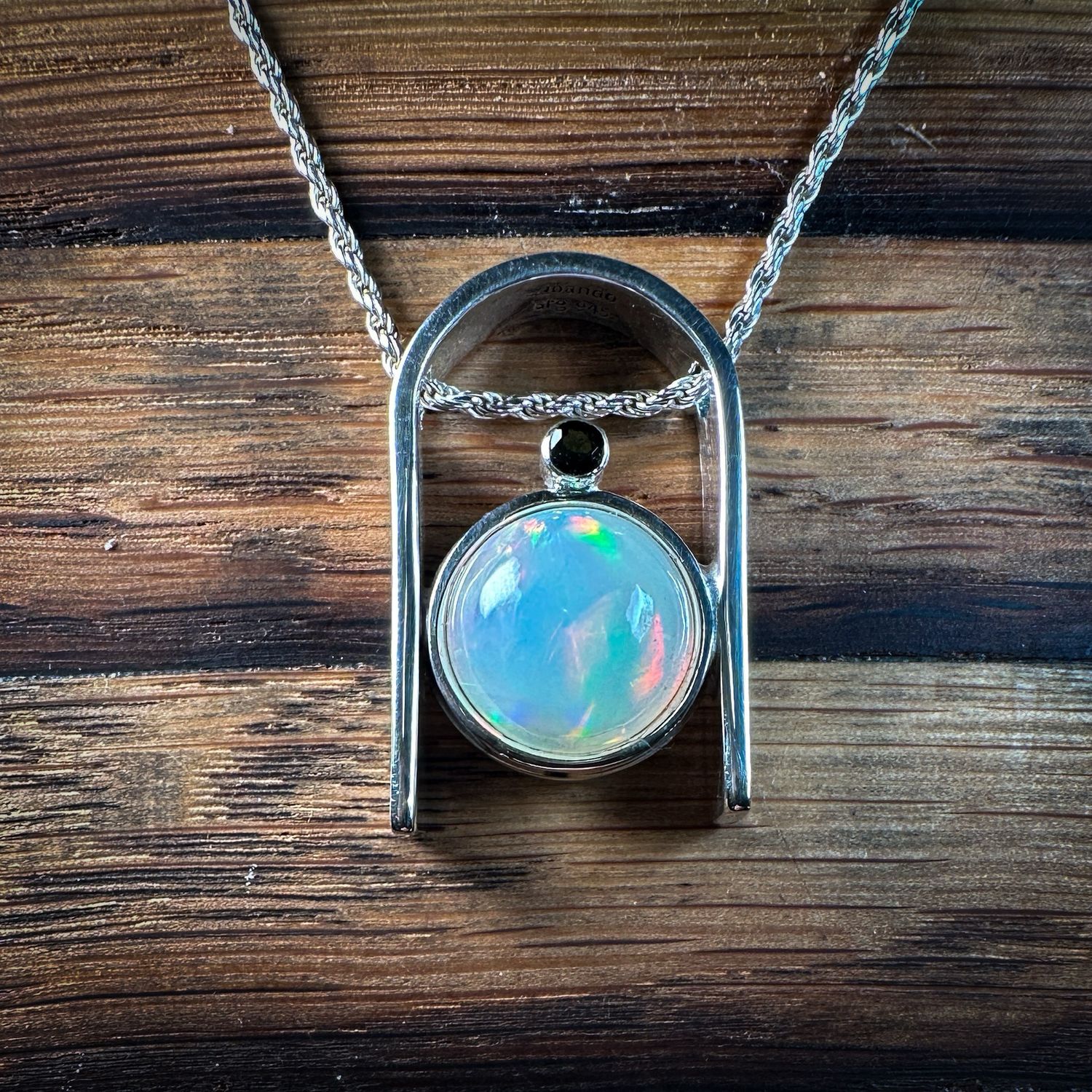 5.35 cts. Welo Opal Pendant with Tourmaline