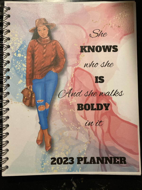 She Knows Who She Is Planner
