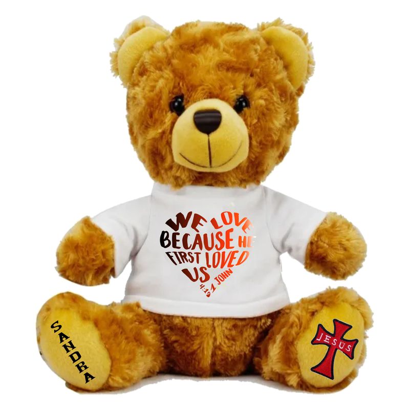 Plush teddy bear wearing a shirt printed with personalized Bible verse and recipient’s name, Christian faith-inspired gift.