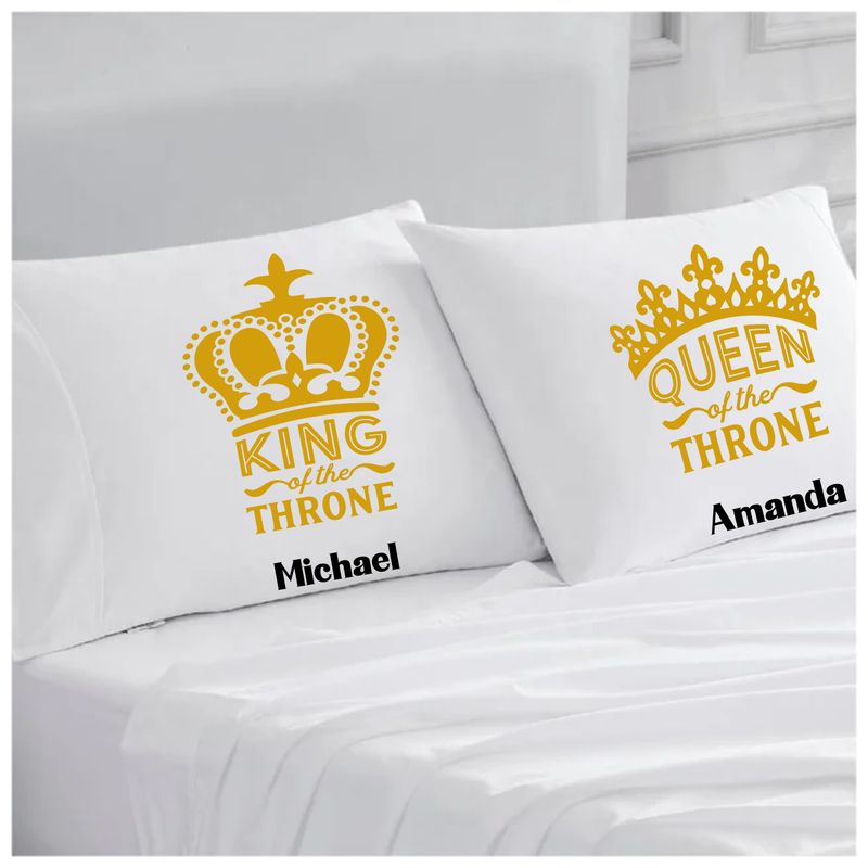 Personalized couples pillowcases with two names printed in a warm, romantic design on soft white fabric.