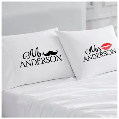 Personalized Couples Pillowcases with Sweet Words | His and Hers Gifts Personalized couples pillowcases with two names printed in a warm, romantic design on soft white fabric.