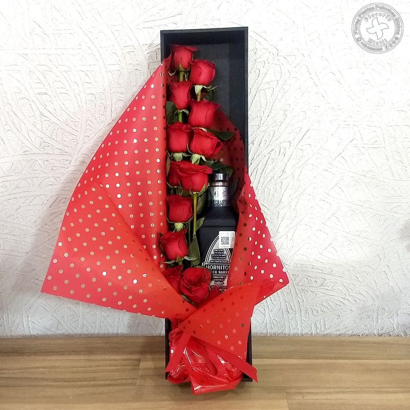 Caja larga 12 rosas con detalle extra