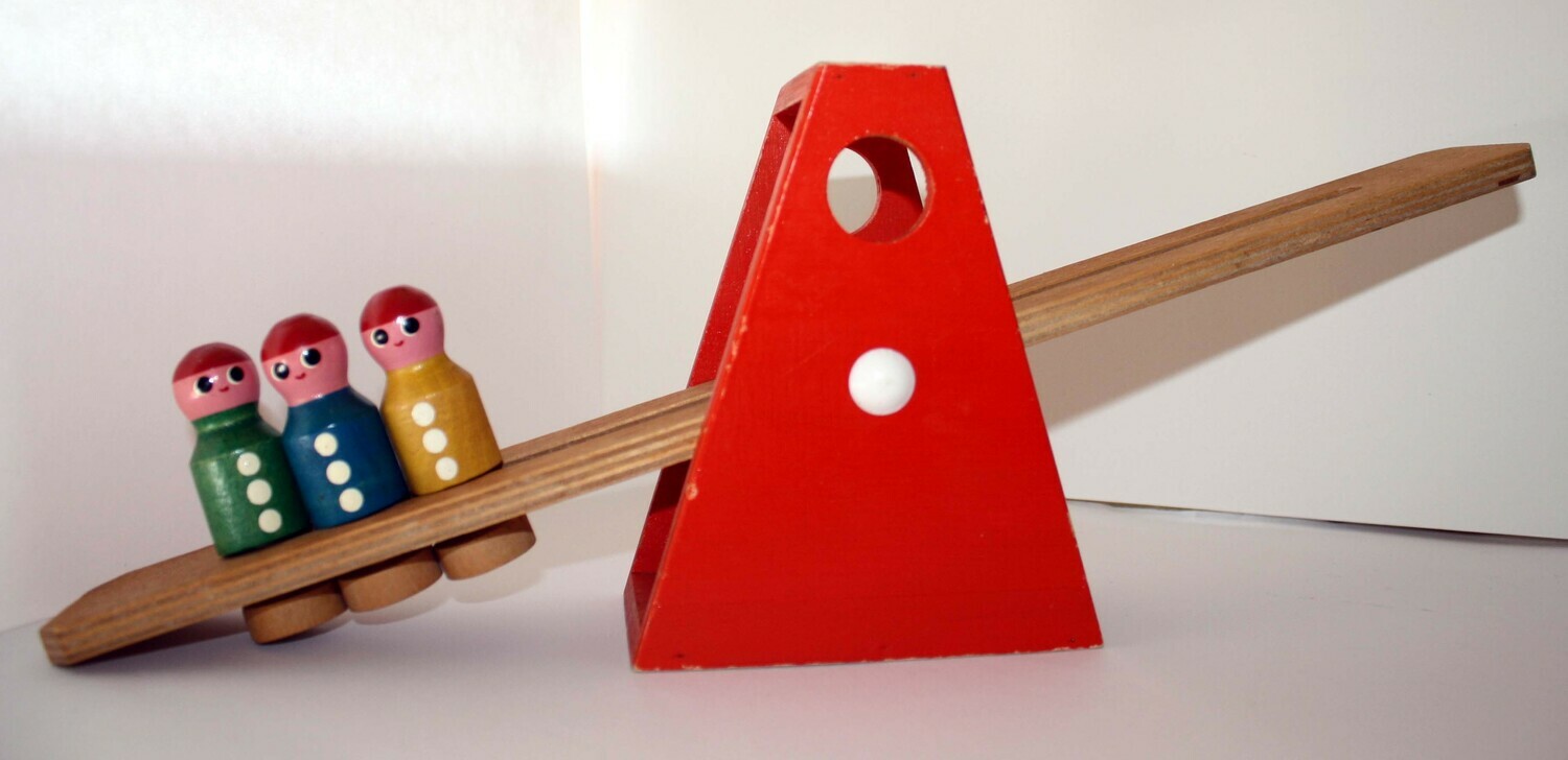Vintage traditional wooden toy see-saw