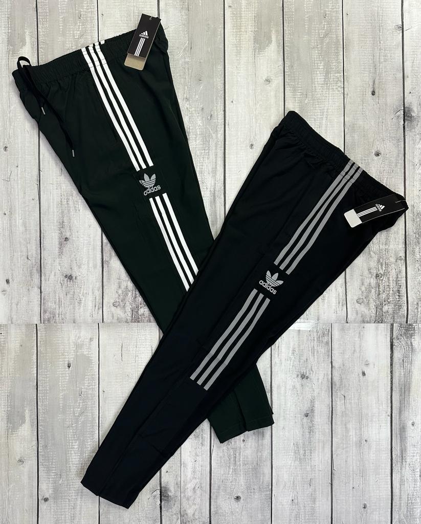 adidas Originals Archive track pants in green and off white | ASOS