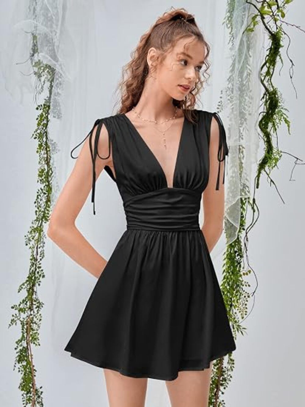 Women's Premium Quality Black Mini Dress Features a Deep V-Neckline and Tie-Strap - 100 Pc