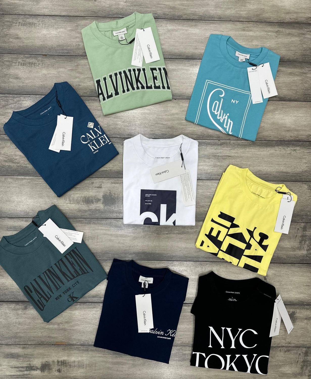 Calvin Klein Premium Quality Round Neck Half Sleeve Men's T-Shirt - 65 Pc