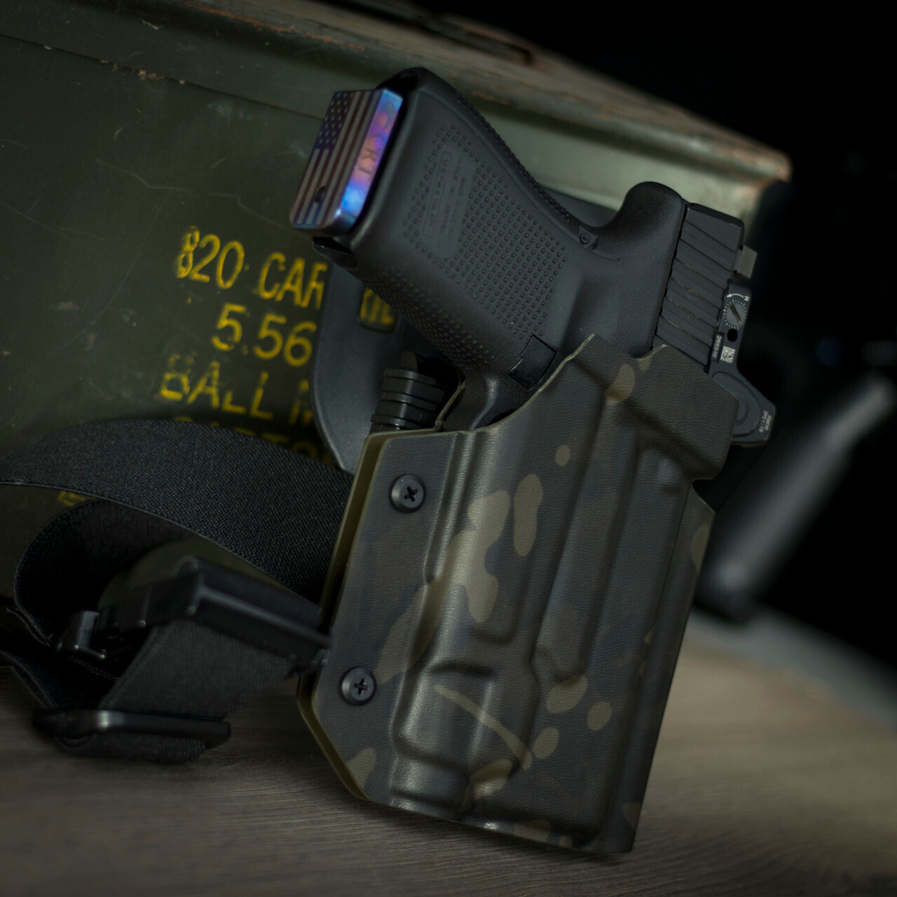 Glock 19 with streamlight TLR7 OWB light bearing holster in Rhodesian brush stroke with Safariland UBL