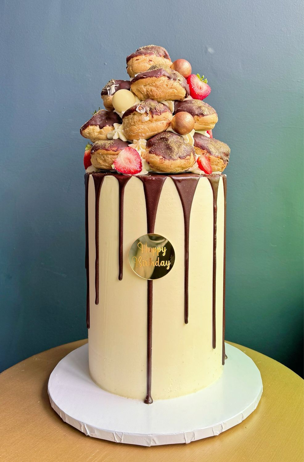 Profiterole Topped Cake