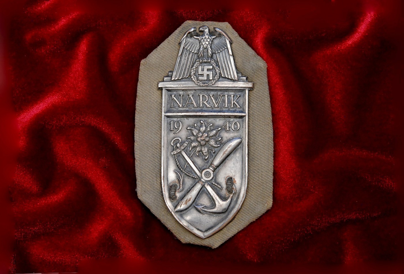 WWII GERMAN NARVIK SHIELD ON TAN TWILL MATERIAL FOR USE ON THE TROPICAL UNIFORM – UNIFORM REMOVED