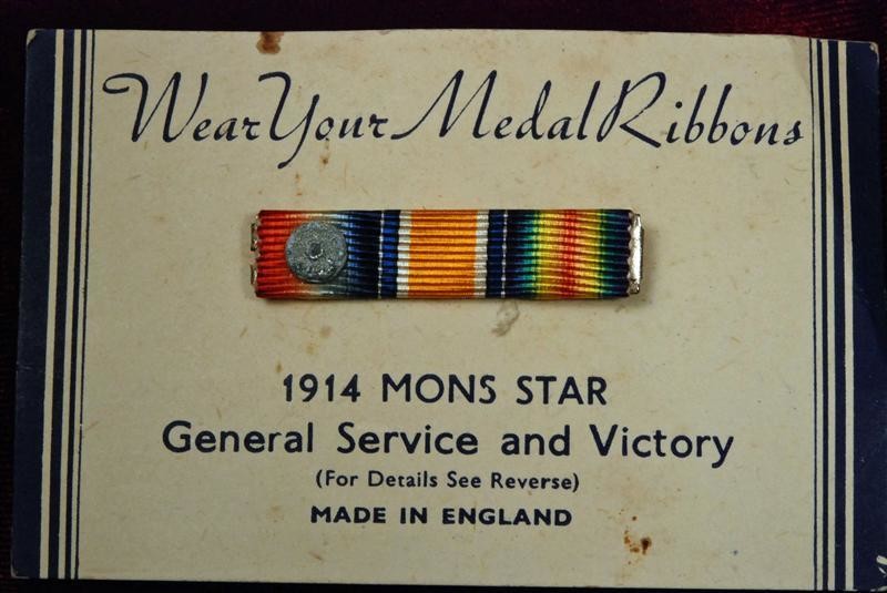 BRITISH WORLD WAR I MEDAL TRIO RIBBON BAR w/MONS STAR DEVICE ON ORIGINAL MANUFACTURER'S CARD - MINIATURE SIZE