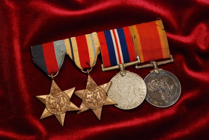 BRITISH WWII MEDAL GROUP OF 4 w/SOUTH AFRICA SERVICE MEDAL - MOUNTED AS WORN