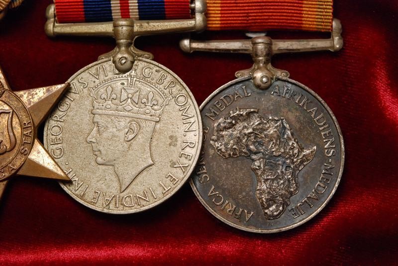 BRITISH WWII MEDAL GROUP OF 4 w/SOUTH AFRICA SERVICE MEDAL - MOUNTED AS WORN