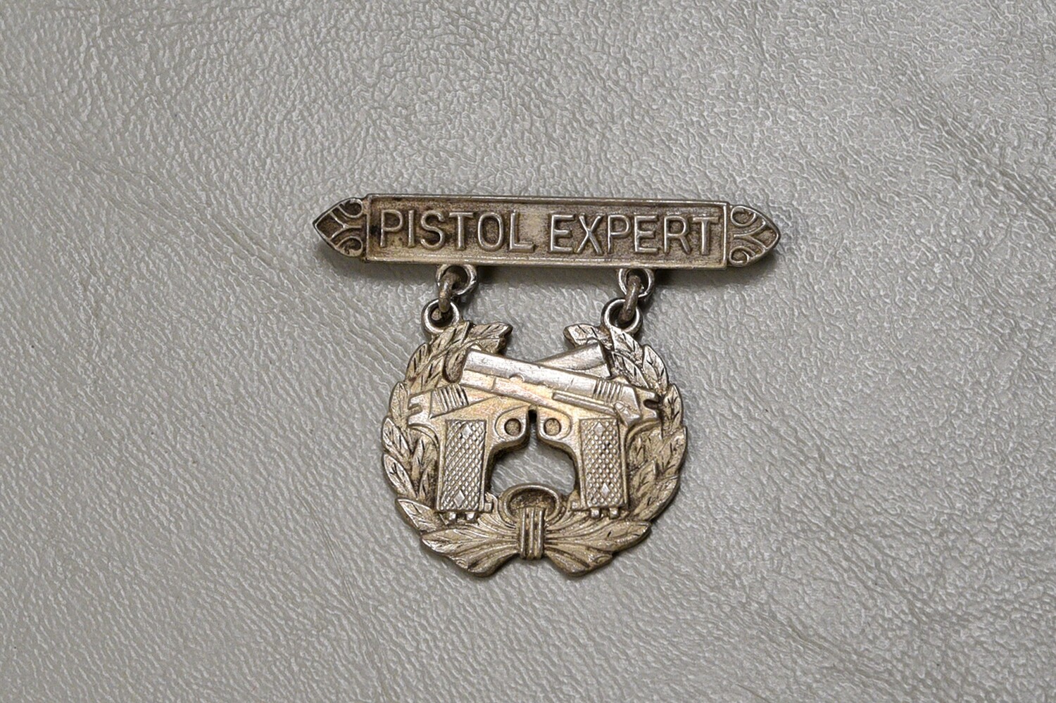 WWII U.S. MARINE CORPS PISTOL EXPERT BADGE - PIN BACK, OPEN CATCH, STERLING