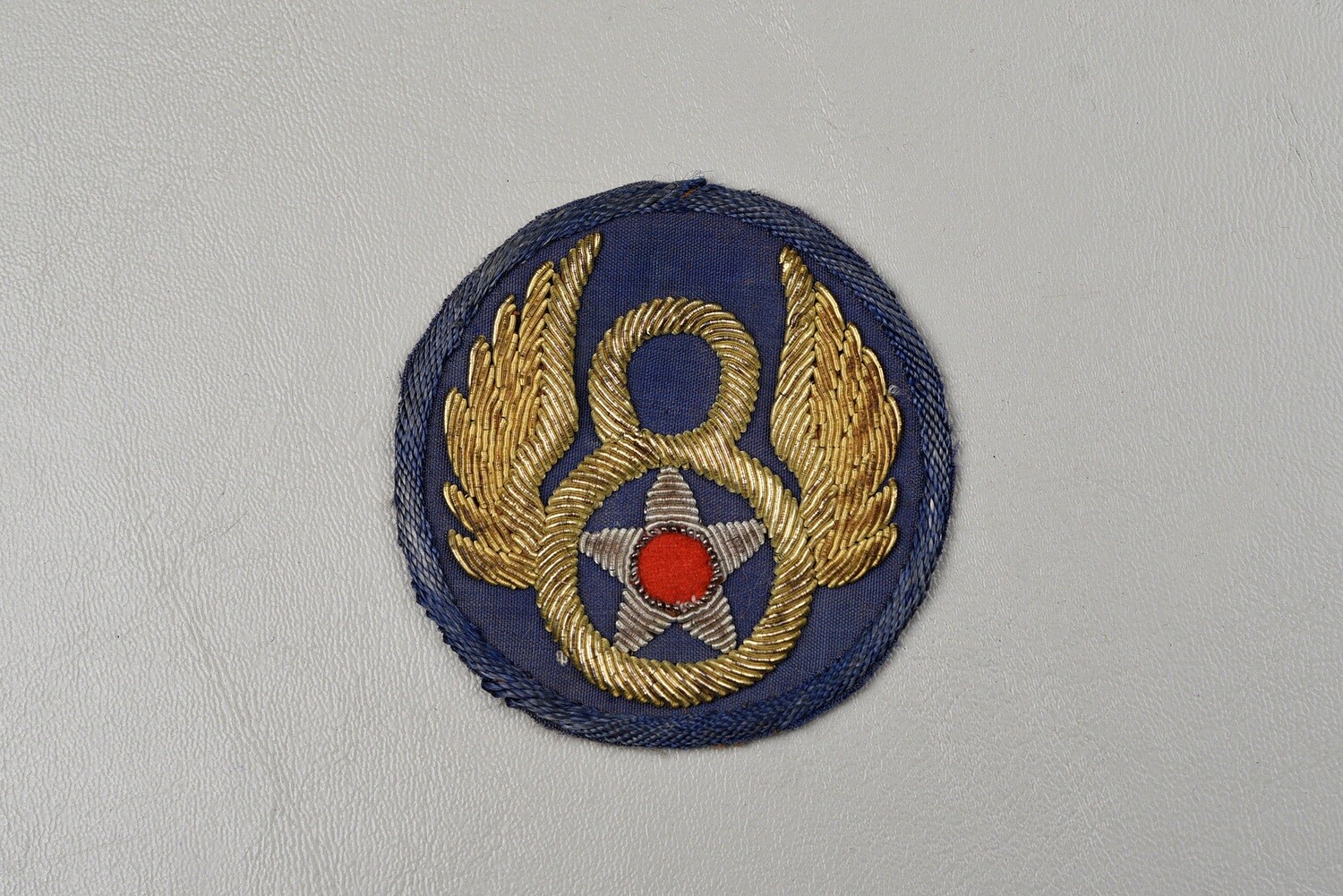 WWII U.S. 8th ARMY AIR CORPS PATCH W/BLUE BORDER - BRITISH MADE, BULLION