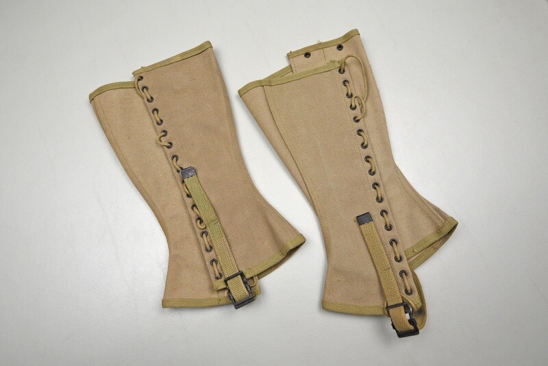 WWII U.S. MODEL 1938 DISMOUNTED LEGGINGS DATED 1942 - NEAR MINT, MATCHED SET WWII U.S. MODEL 1938 DISMOUNTED LEGGINGS DATED 1942 - NEAR MINT, MATCHED SET