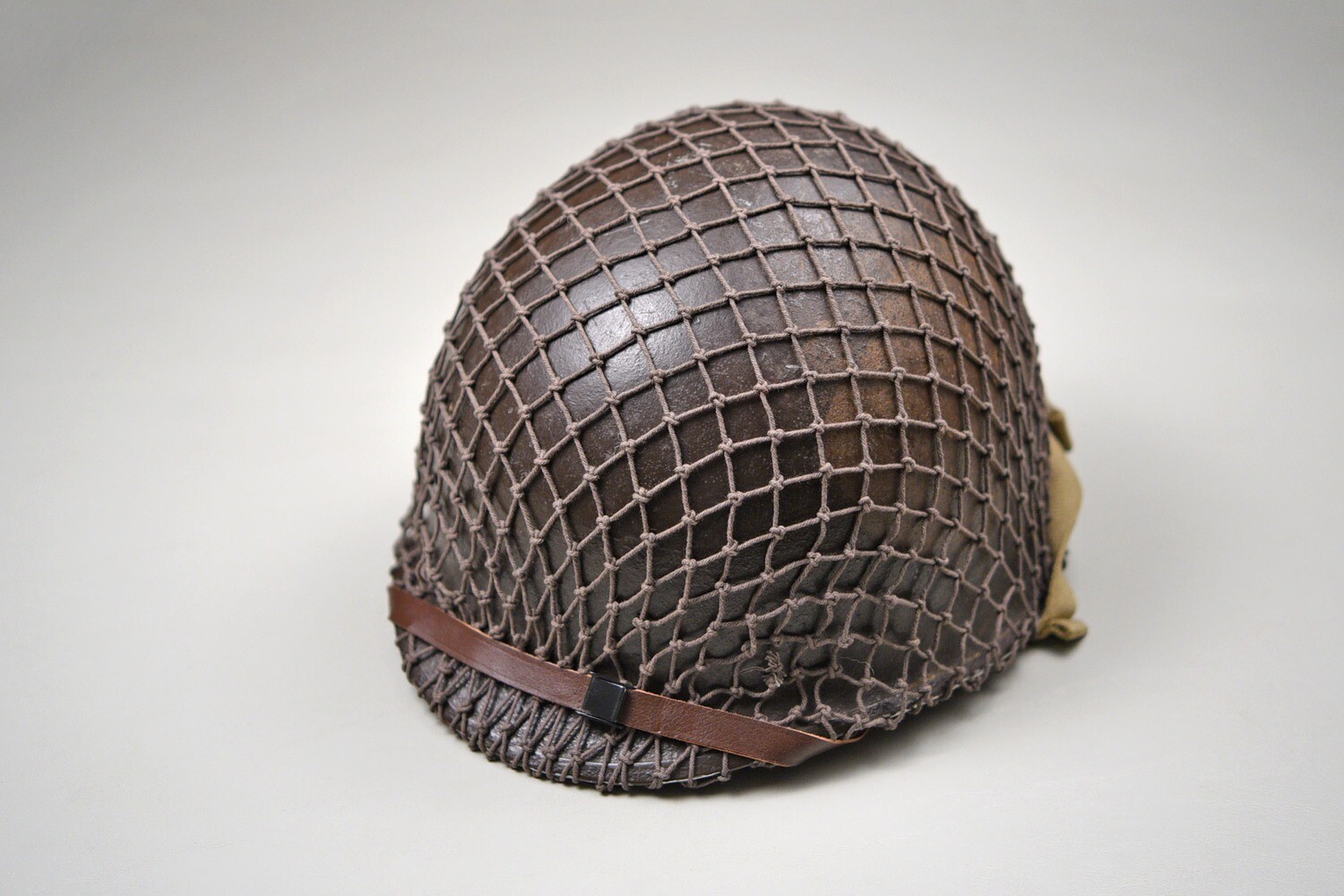WWII U.S. M1 STEEL HELMET w/INVASION NET - FRONT SEAM, FIXED BALE