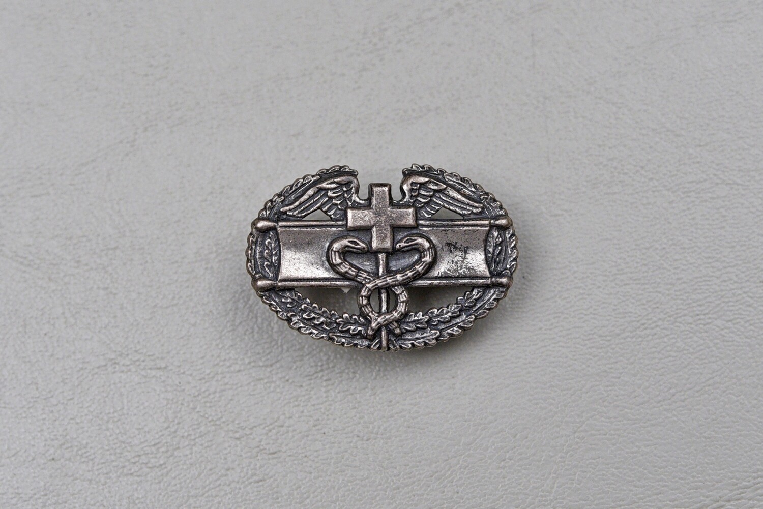 WWII U.S. COMBAT MEDIC BADGE w/CUT OUT SNAKES - STERLING