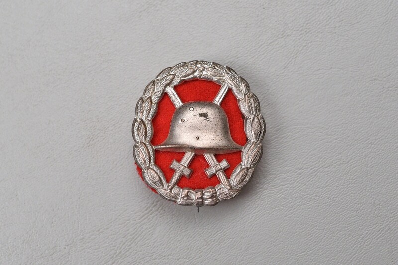 WWI GERMAN 1918 SILVER WOUND BADGE - -CUT OUT w/RED CLOTH BACKING WWI GERMAN 1918 SILVER WOUND BADGE - -CUT OUT w/RED CLOTH BACKING