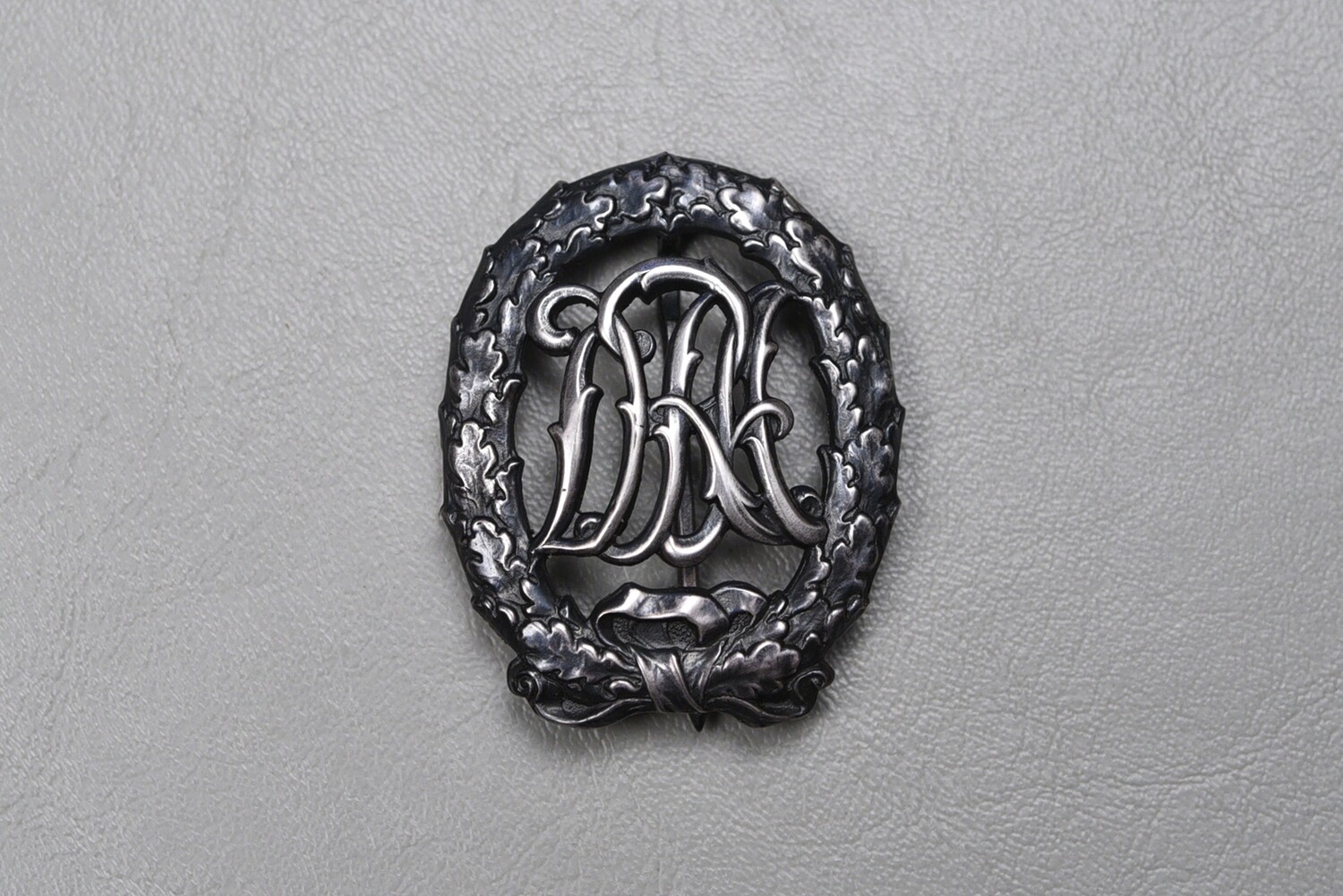 WWII GERMAN PRE-1937 DRA SPORTS BADGE IN SILVER - WERNSTEIN MARKED