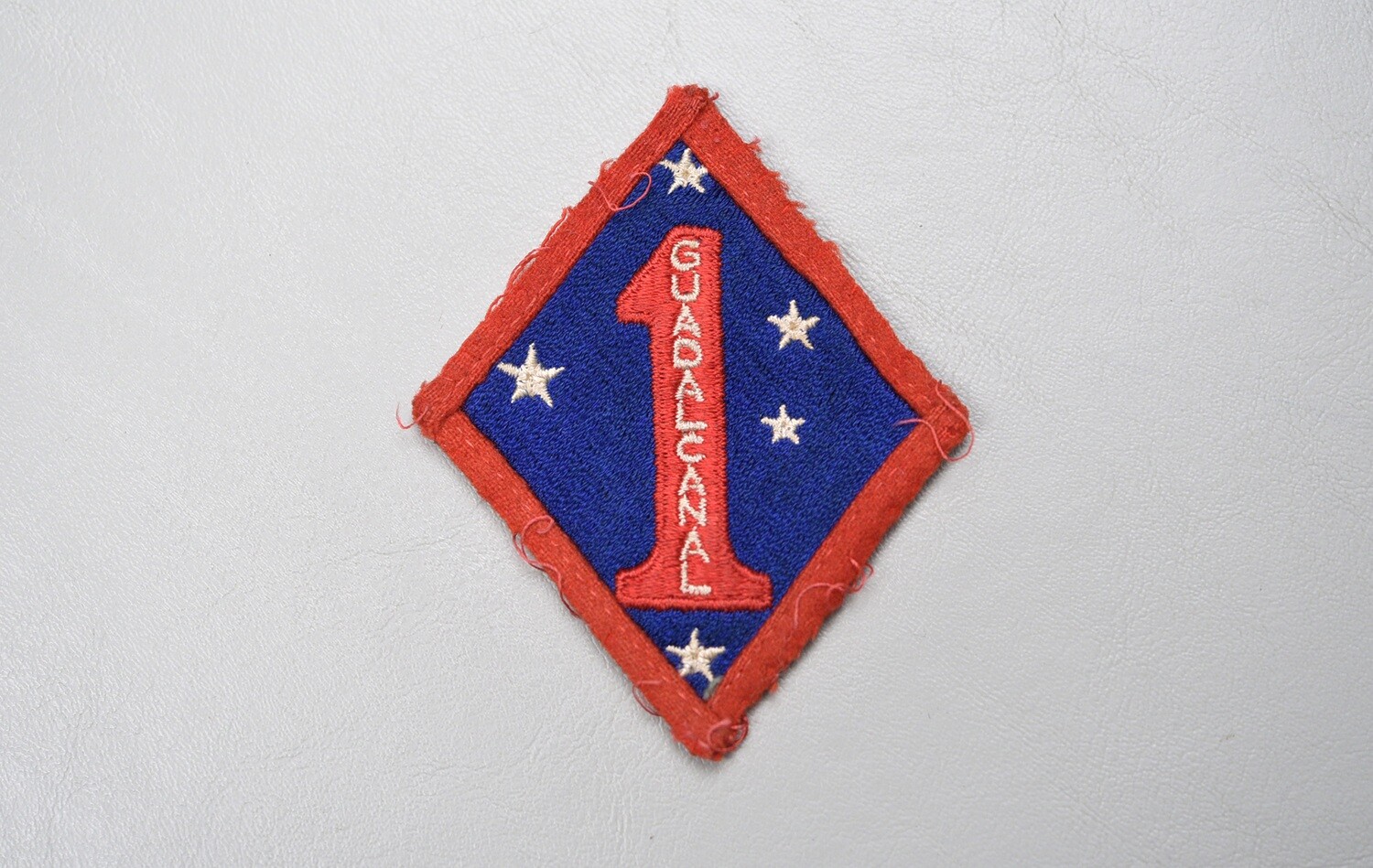 WWII U.S. MARINE CORPS 1st MARINE DIVISION BLOODED PATCH – UNIFORM REMOVED