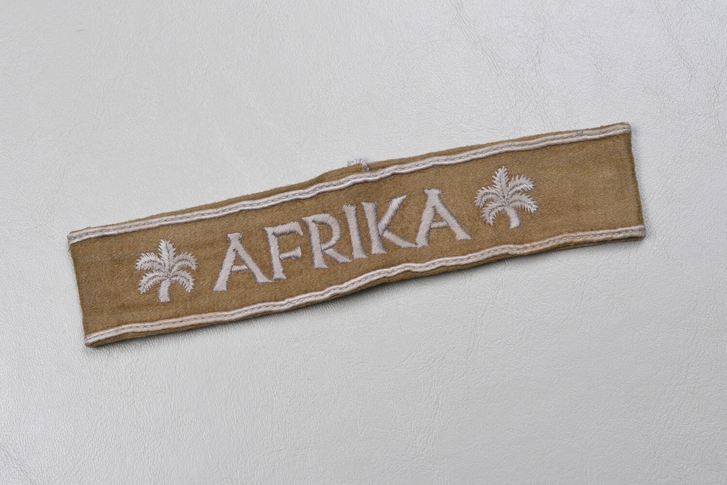 WWII GERMAN ‘AFRIKA’ CUFF TITLE w/SEWN ENDS