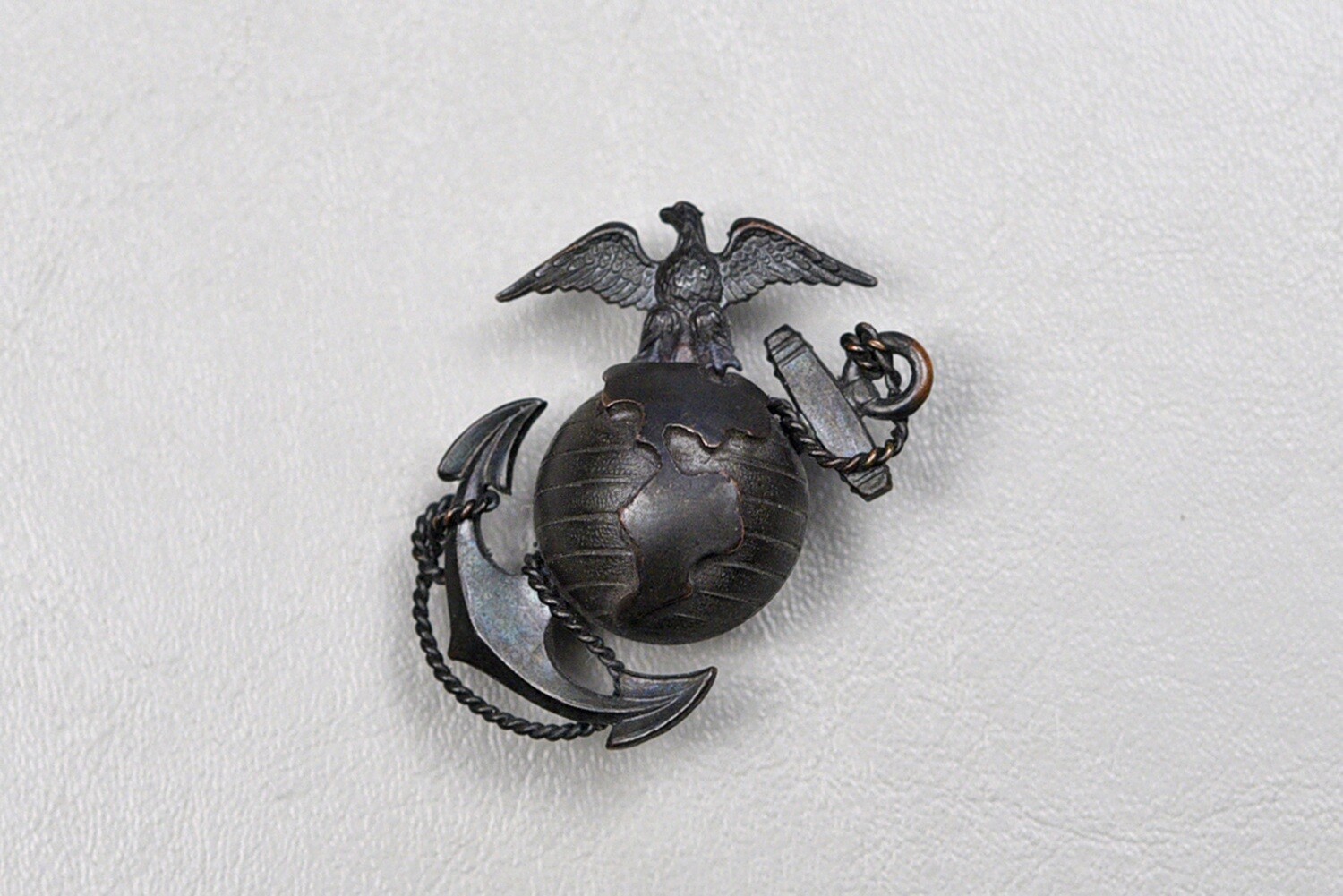 WWII U.S. MARINE CORPS OFFICERS M1937 EAGLE, GLOBE, &amp; ANCHOR VISOR HAT INSIGNIA – N.S. MEYER, N.Y.