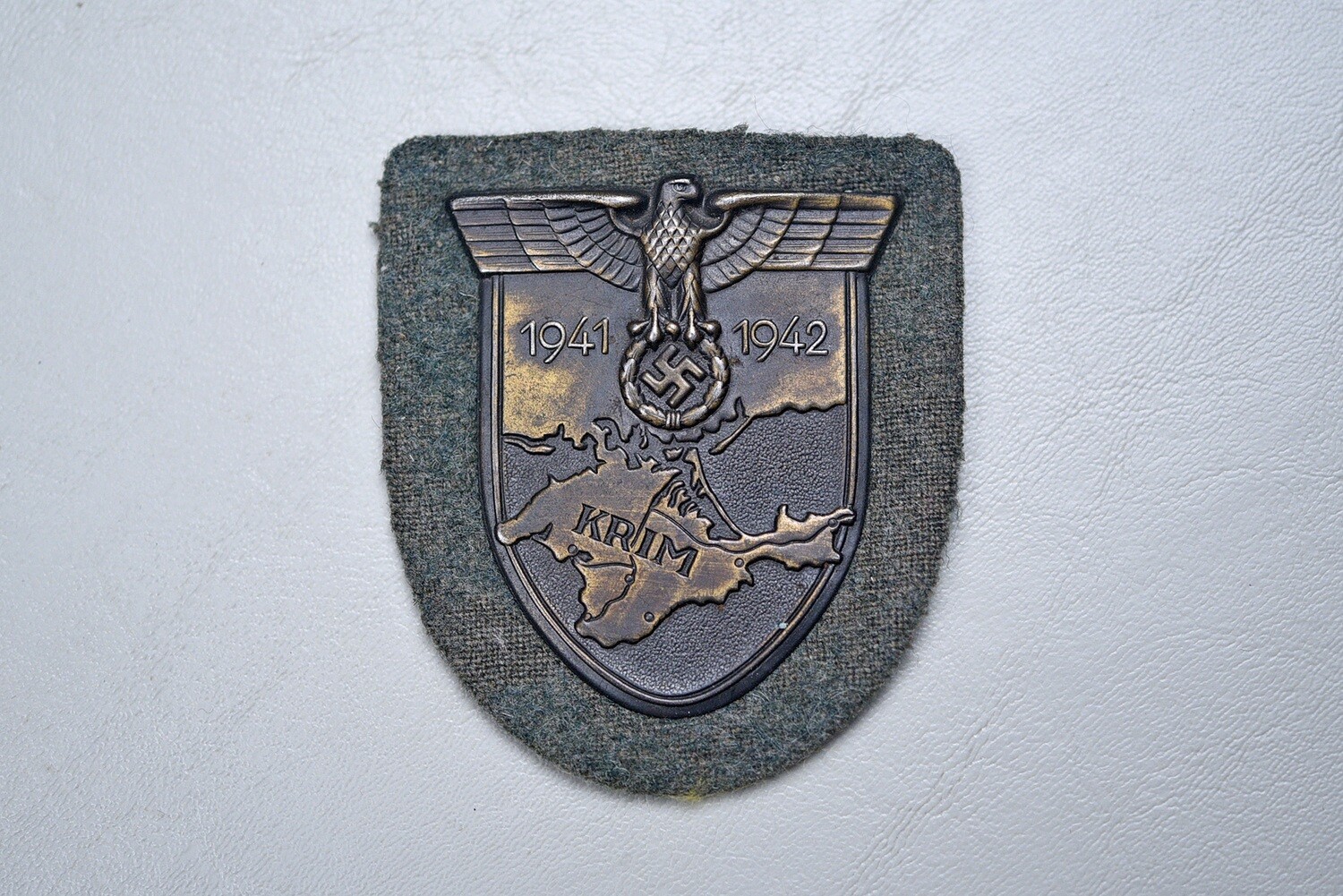 WWII GERMAN KRIM SHIELD ON ARMY BACKING