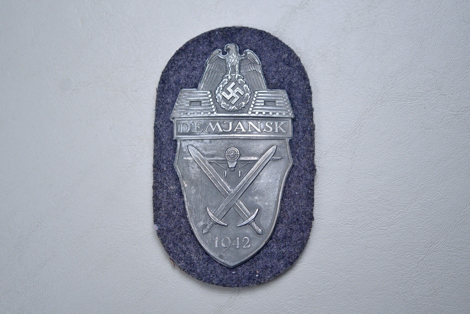 WWII GERMAN DEMJANSK SHIELD ON LUFTWAFFE BACKING