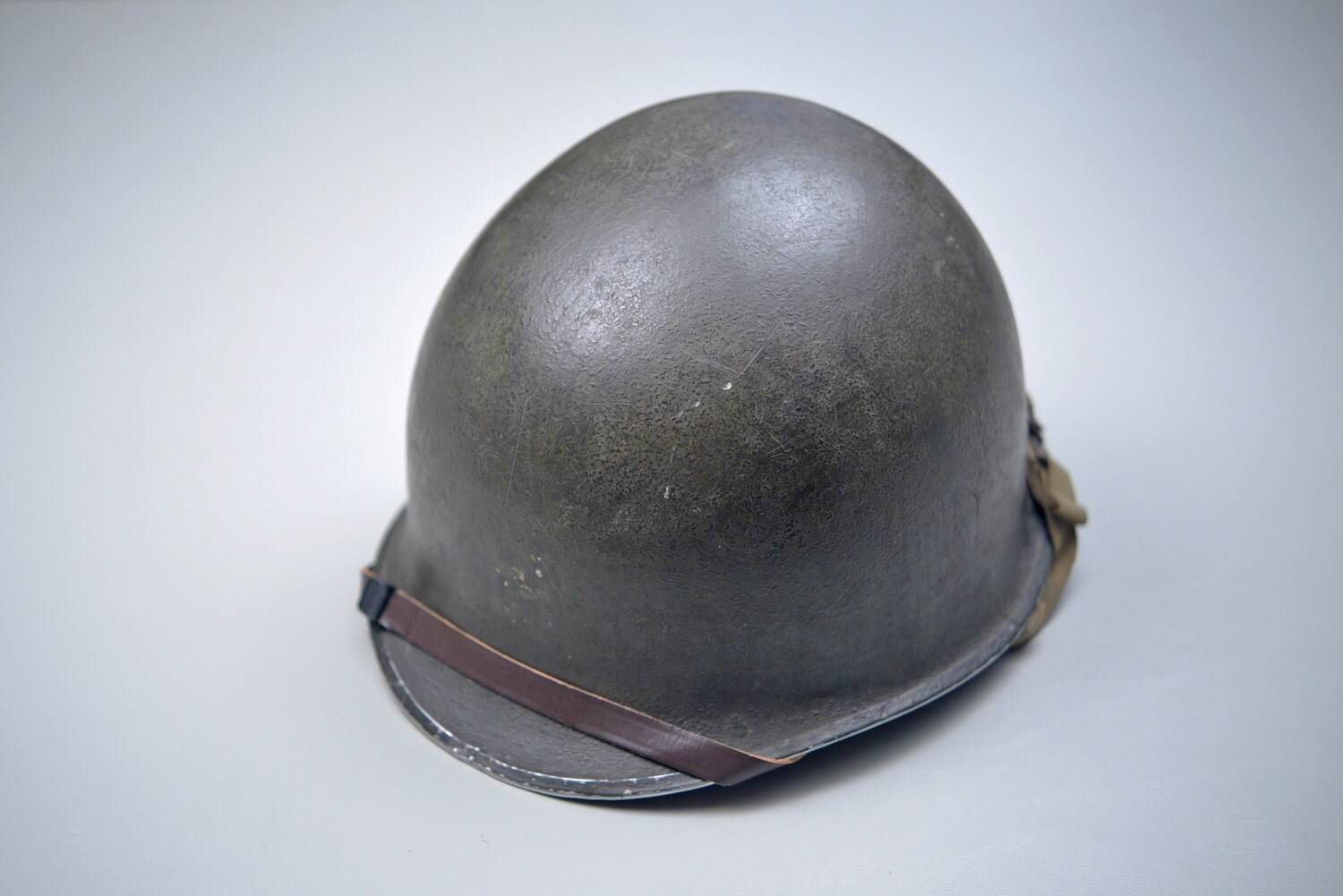 WWII U.S. M 1 STEEL COMBAT HELMET – FRONT SEAM, FIXED BALES, COMPLETE
