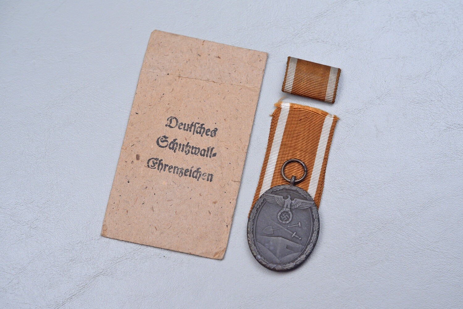 WWII GERMAN WEST WALL MEDAL IN TITLED PACKET
