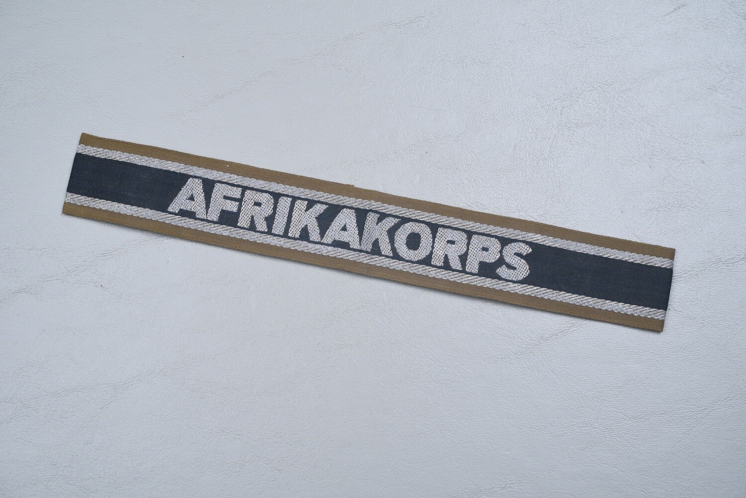 WWII GERMAN ‘AFRIKAKORPS’ CUFF TITLE