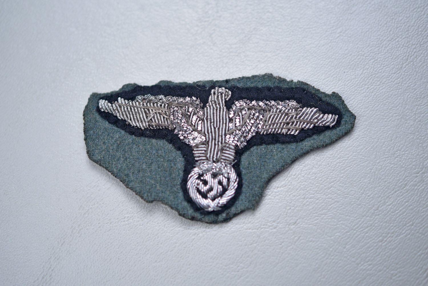 WWII GERMAN SS OFFICER&#39;S BULLION CAP EAGLE - CUT FROM FELDMUTZ