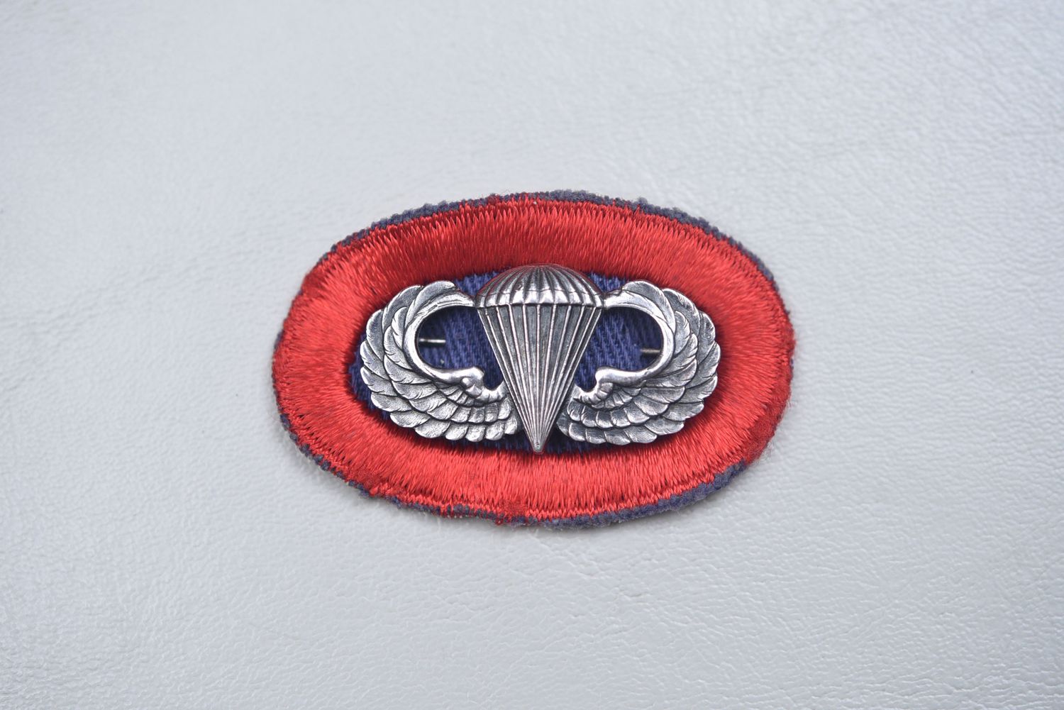 WWII U.S. ARMY PARATROOPER BADGE ON 505th OVAL - PINBACK, STERLING