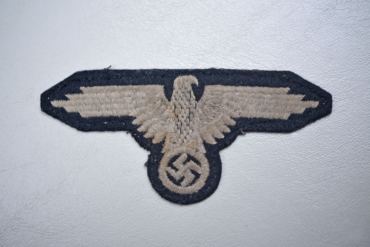 WWII GERMAN WAFFEN SS ENLISTED SLEEVE EAGLE ON WOOL - UNIFORM REMOVED