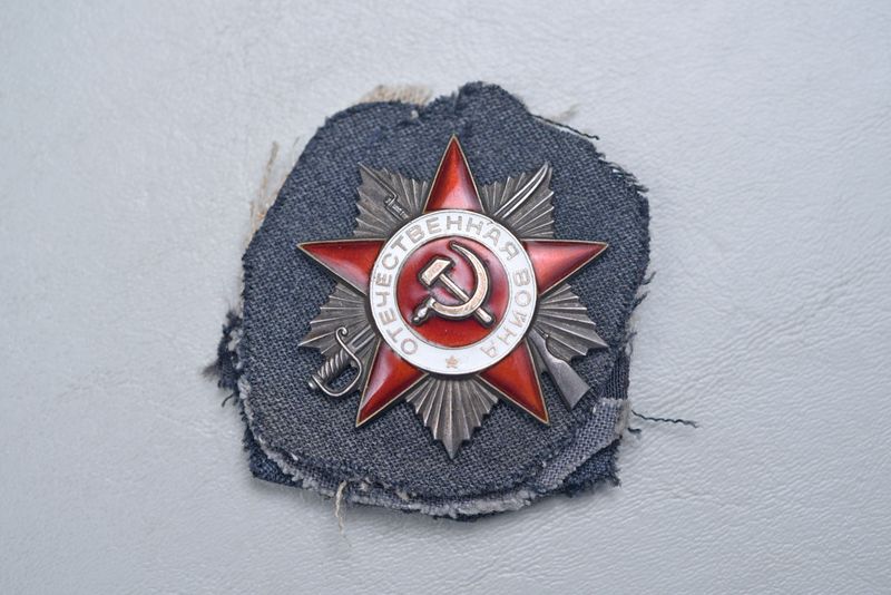 post-WWII SOVIET ORDER OF THE PATRIOTIC WAR 2nd CLASS – CUT FROM UNIFORM post-WWII SOVIET ORDER OF THE PATRIOTIC WAR 2nd CLASS – CUT FROM UNIFORM