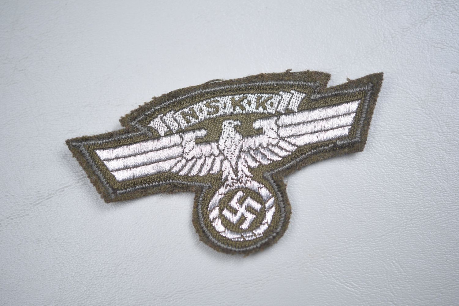 WWII GERMAN NSKK ARM EAGLE w/PAPER TAG