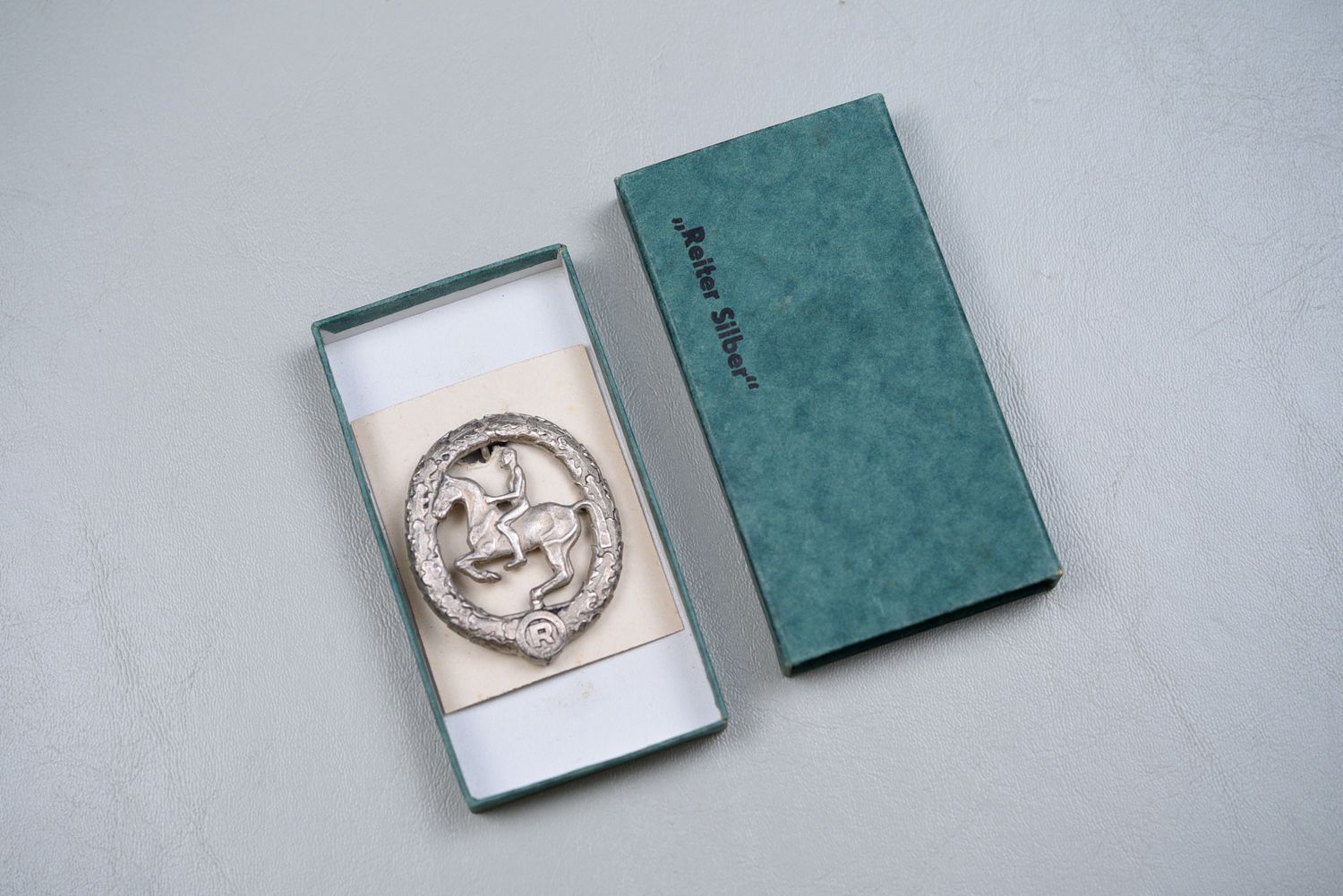 WWII GERMAN EQUESTRIAN HORSEMANSHIP BADGE IN SILVER - BOXED