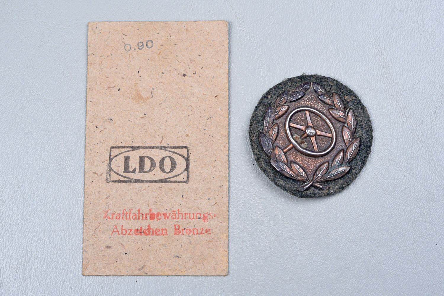 WWII GERMAN DRIVER PROFICIENCY BADGE IN BRONZE w/ISSUE PACKET