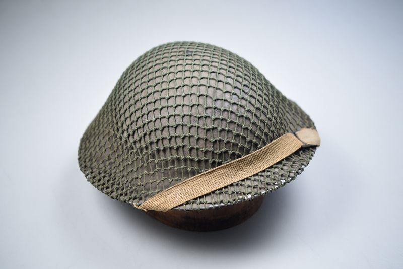 WWII BRITISH MK II ‘TOMMY’ HELMET w/ORIGINAL NET BY J.S.S. – DATED 1938