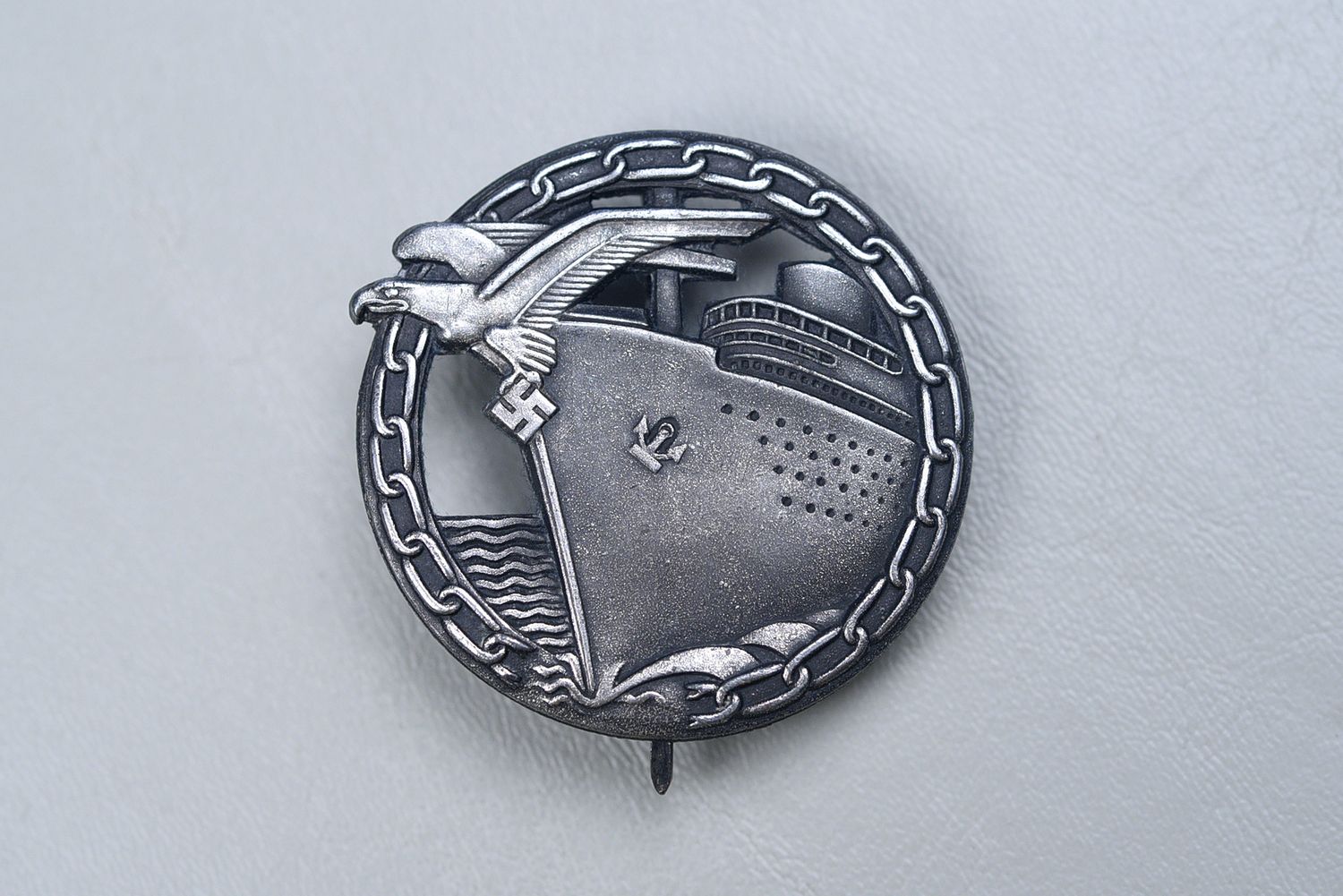 WWII GERMAN KRIEGSMARINE BLOCKADE RUNNER BADGE BY SCHWERIN
