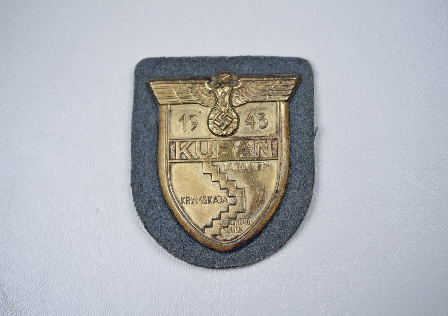 WWII GERMAN KUBAN SHIELD ON ARMY BACKING w/FULL PAPER BACK