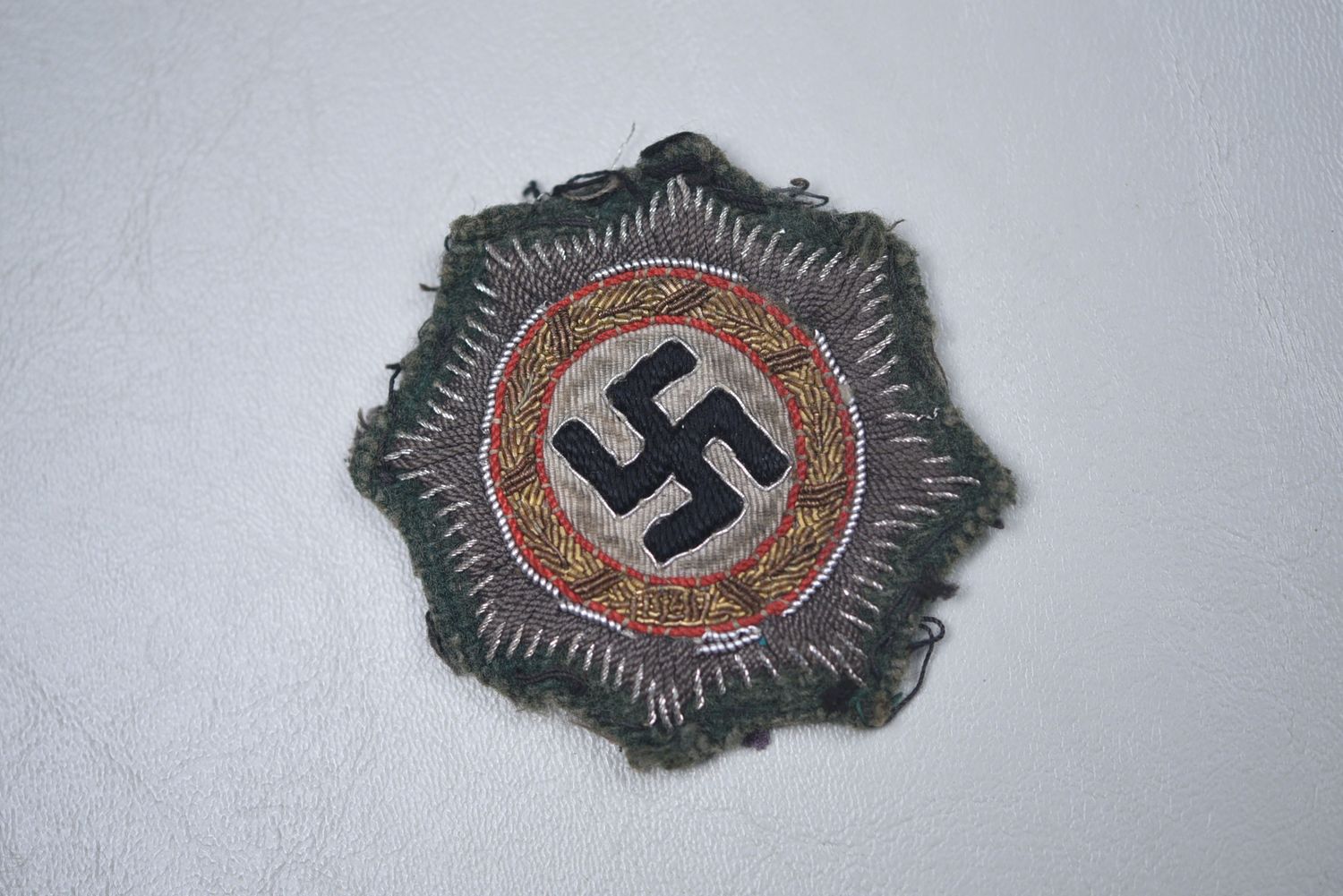 WWII GERMAN CROSS IN GOLD - CLOTH TYPE, UNIFORM REMOVED
