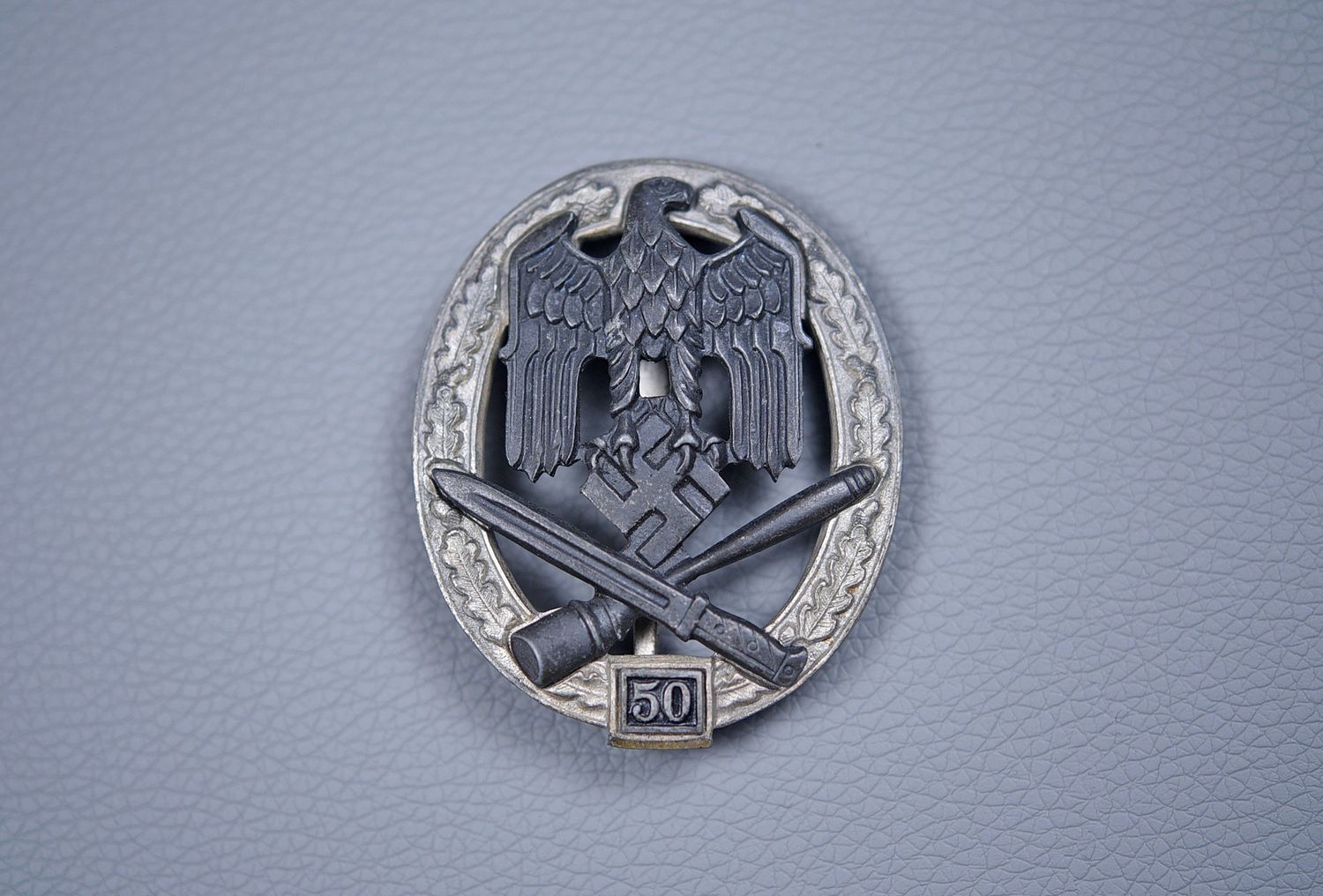 WWII GERMAN NUMBERED GENERAL ASSAULT BADGE IN SILVER FOR 50 ENGAGEMENTS BY RK