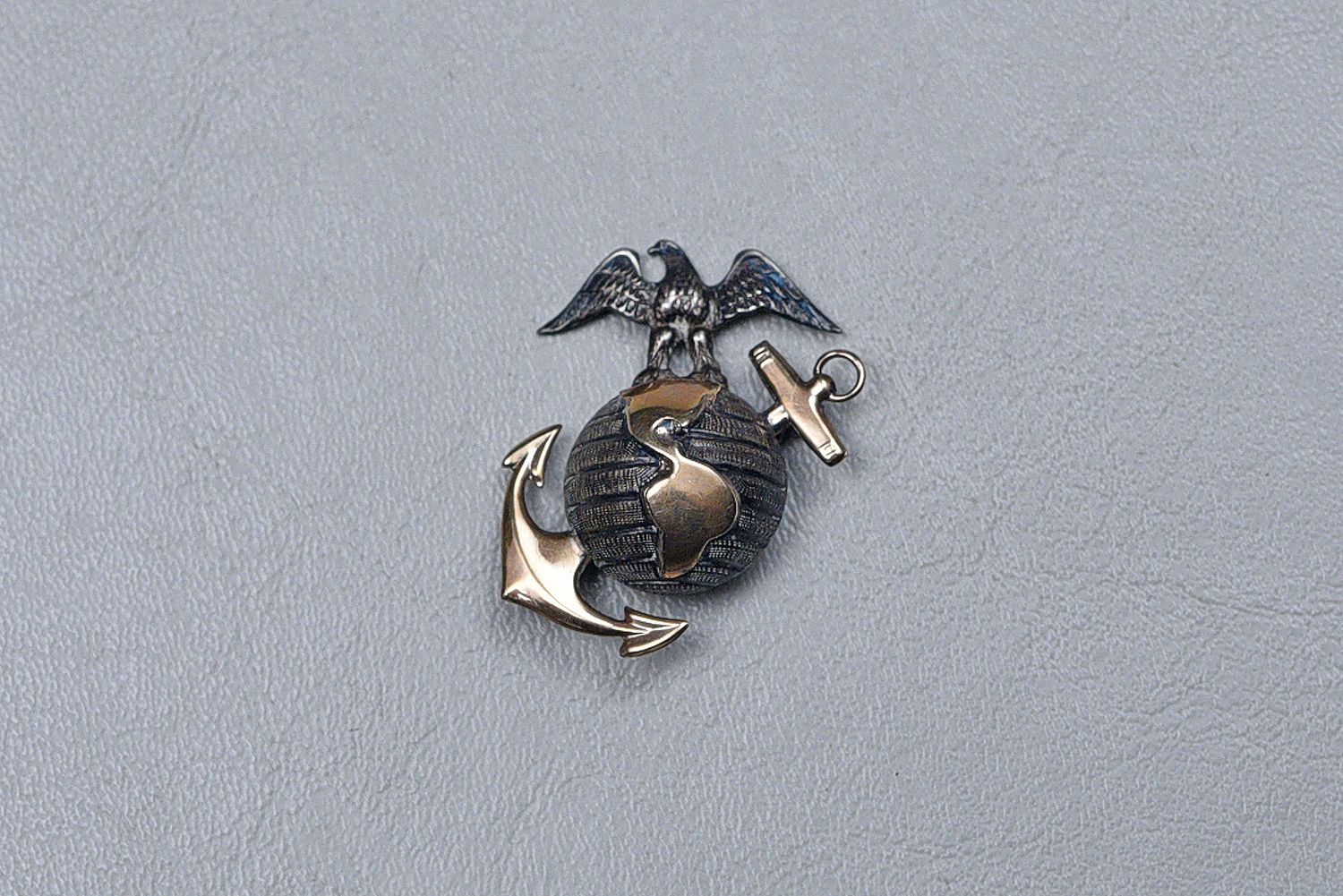 WWII U.S. MARINE CORPS M1937 DRESS BLUES LEFT SIDE EGA - PIN BACK WWII U.S. MARINE CORPS M1937 DRESS BLUES LEFT SIDE EGA - PIN BACK