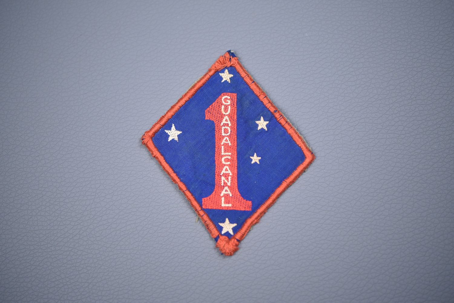 WWII U.S. 1st MARINE DIVISION 'BLOODED' SHOULDER PATCH - AUSTRALIAN MADE